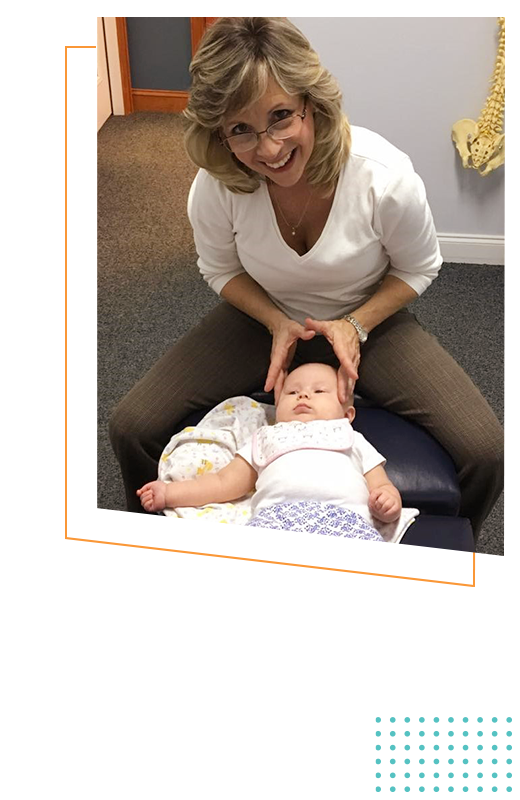 Chiropractor Mint Hill NC Kelley Helmendach and baby HP