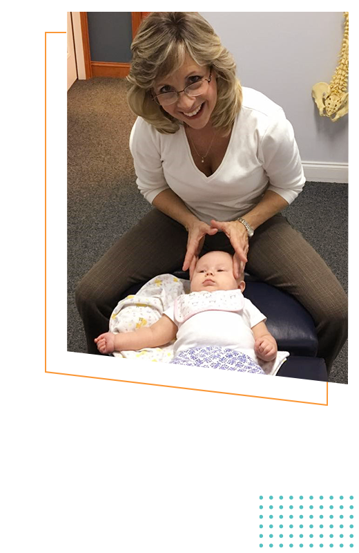 Chiropractor Mint Hill NC Kelley Helmendach and baby HP Chiropractor Mint Hill NC Kelley Helmendach and baby HP